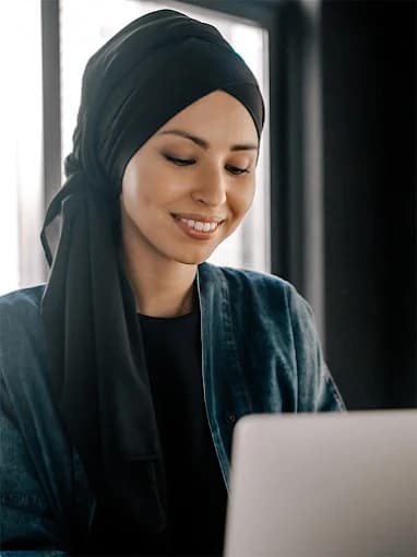 UAE property professional working with a client